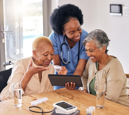 tablet-smile-assisted-living-nurse-with-old-women-kitchen-retirement-home-consulting-technology-medical-african-caregiver-showing-information-patient-friends_590464-238538 tablet-smile-assisted-living-nurse-with-old-women-kitchen-retirement-home-consulting-technology-medical-african-caregiver-showing-information-patient-friends_590464-238538